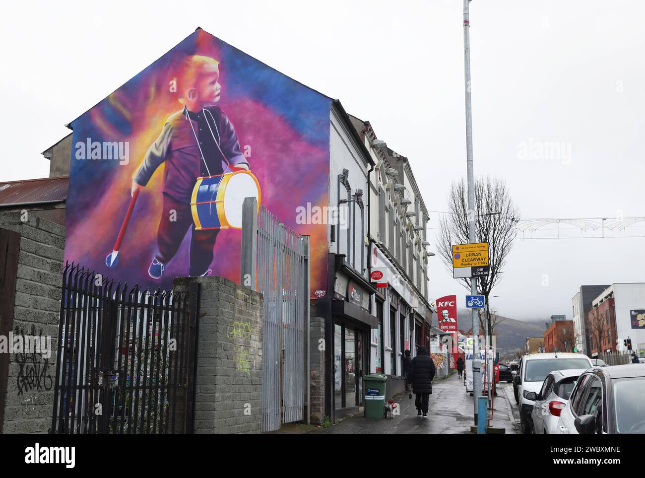 New Shankill Road mural unveiled to improve the area, a young drummer boy brings a vivid splash of colour, painted by street artist Glen Mo Stock Photo