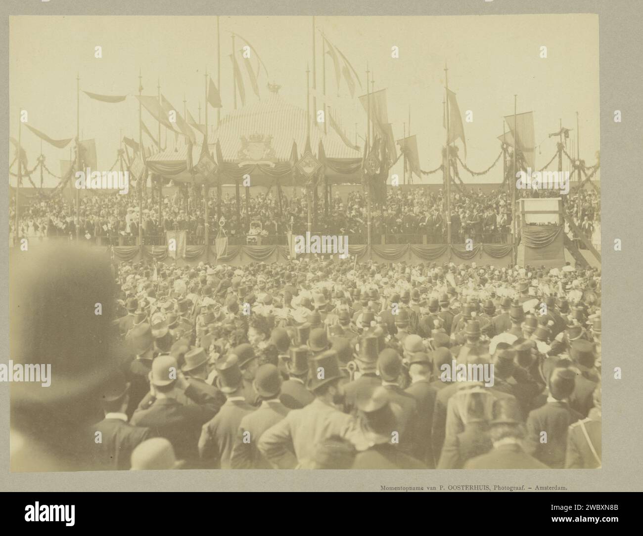 Queen Wilhelmina and Regentes Emma during the first stone laying of the Wilhelmina Gasthuis in Amsterdam under the watchful eye of a large audience., Gustaaf Oosterhuis (attributed to), 1891 photograph  Amsterdam paper albumen print  Amsterdam Stock Photo