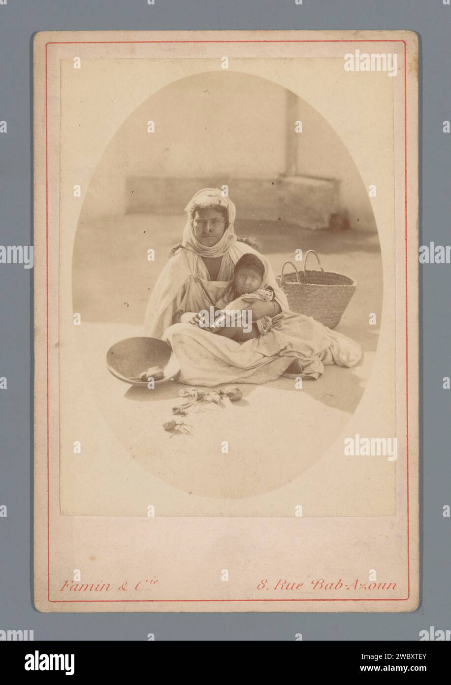 Portrait of an unknown mother and child, Famin et Cie., 1863 - 1889 cabinet photograph  Algeria cardboard. photographic support albumen print anonymous historical person portrayed. mother and baby or young child Algeria Stock Photo