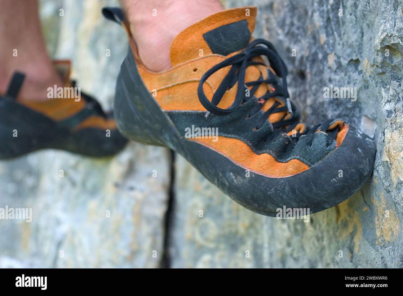 friction climbing shoes on a small foothold, limestone, Swabia, Germany Stock Photo