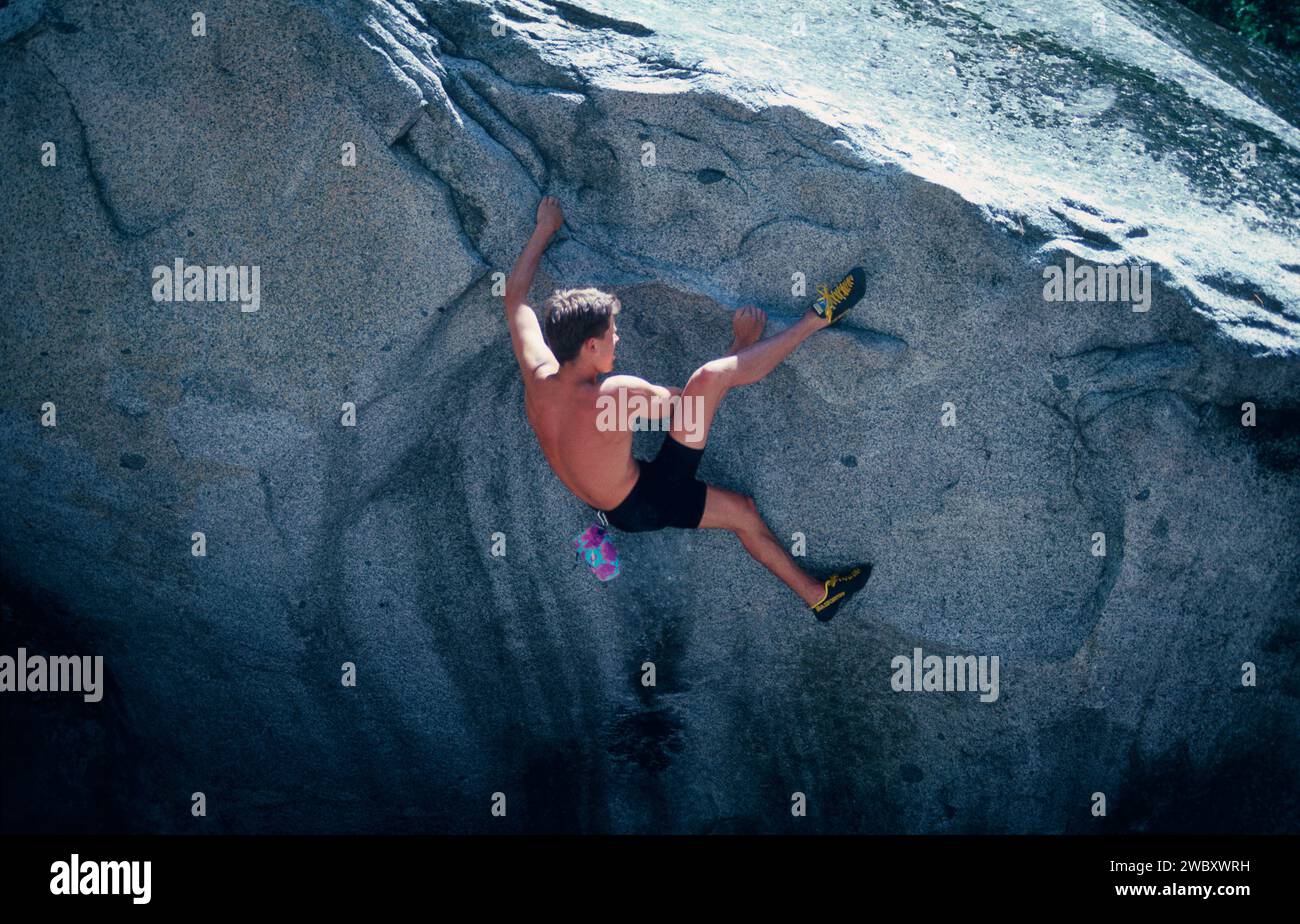 young man bouldering in Yosemite Valley, California, USA Stock Photo