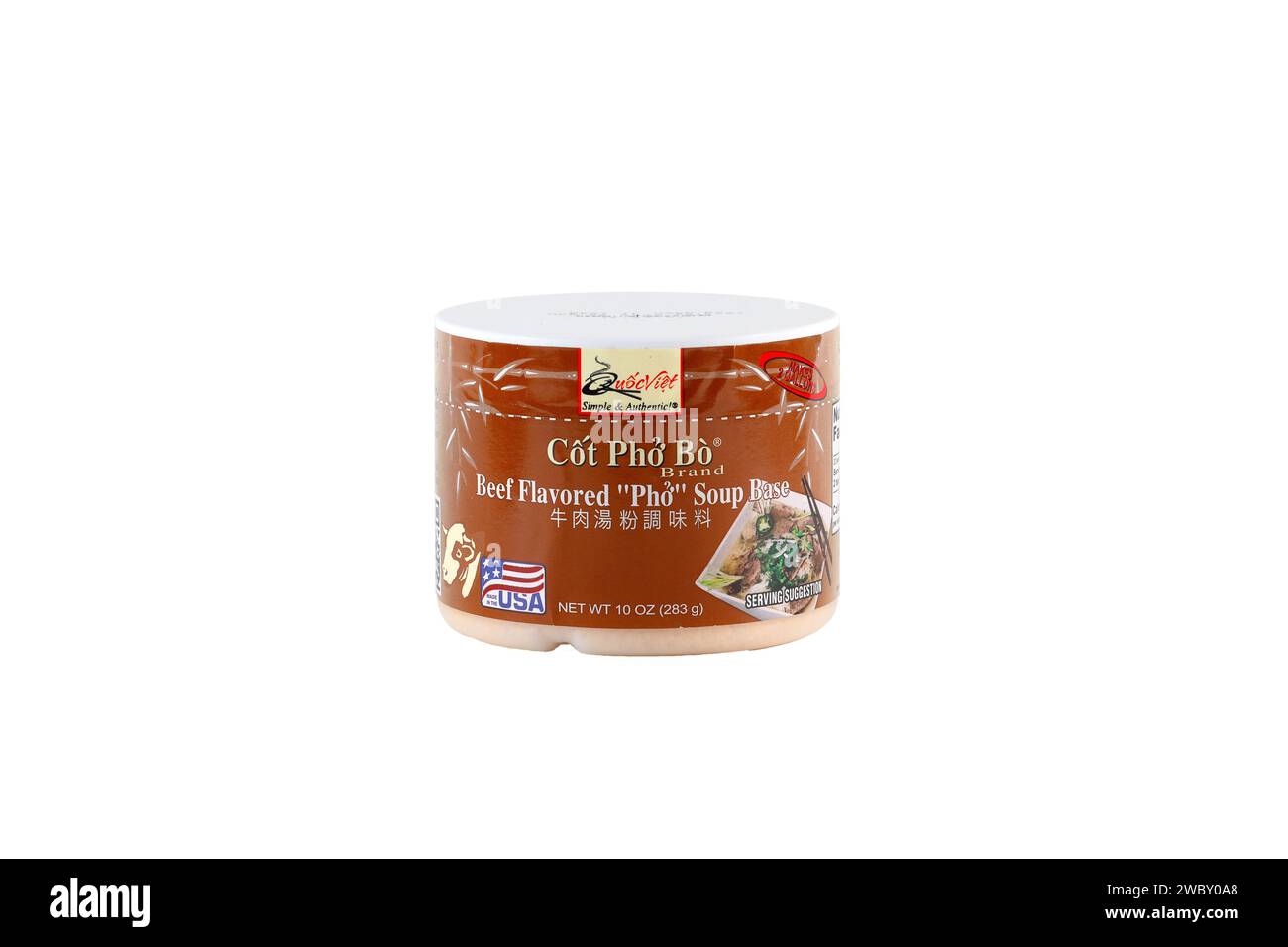 A container of Quốc Việt brand Cốt Phở Bò beef flavored Pho soup base isolated on a white background. cutout image for illustration and editorial use Stock Photo