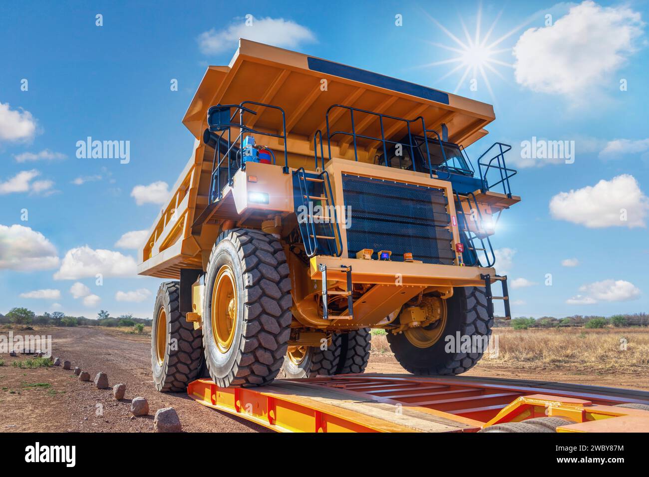 transport oversize load, loading a mining truck in a trailer to transport to a diamond mine