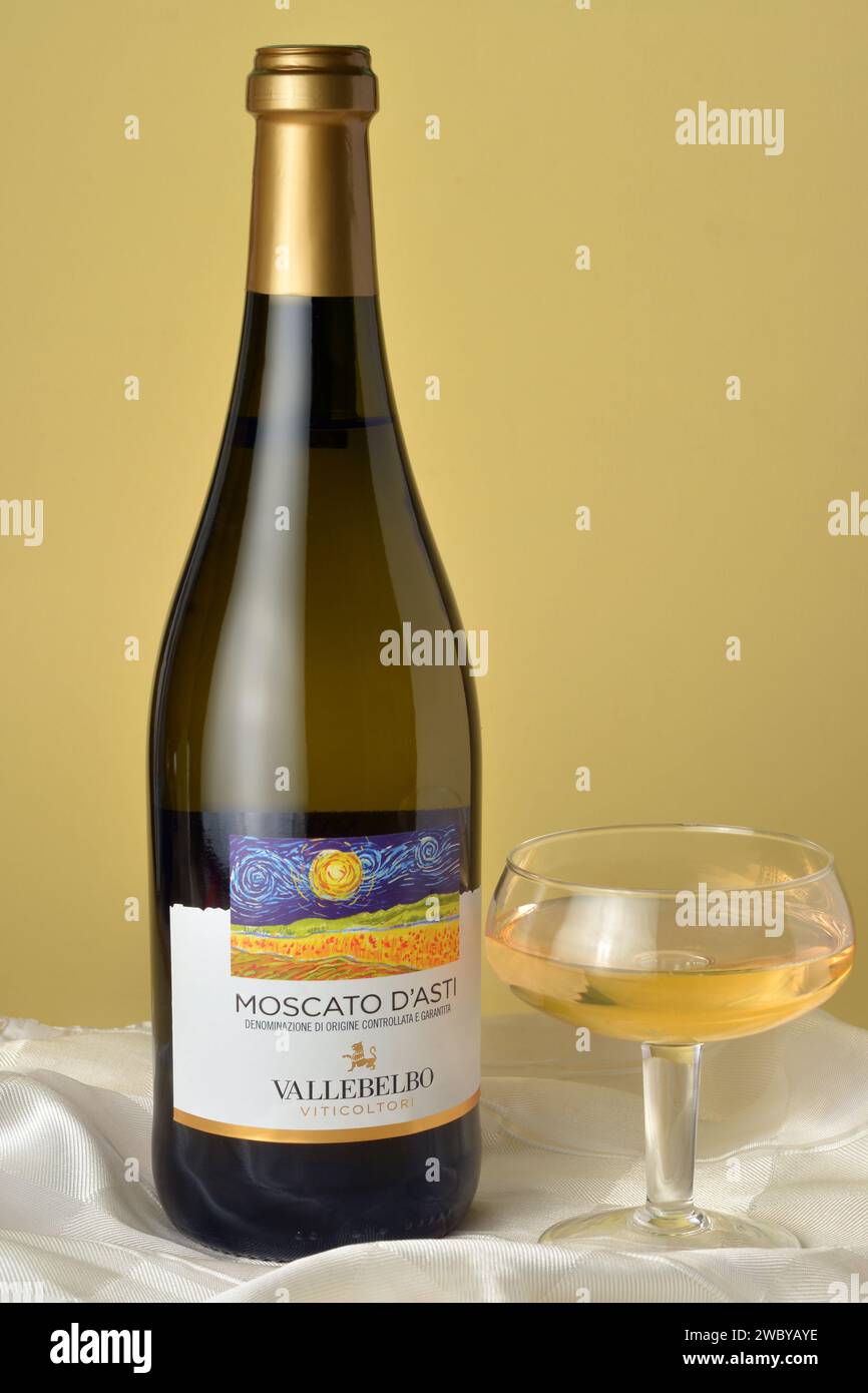 Turin, Piedmont, Italy. 01122023 Bottle and glass of sweet