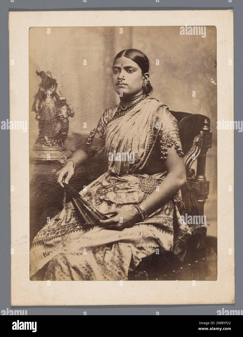 Portrait of an unknown Indian woman, anonymous, 1860 - 1890 photograph  British India paper. cardboard albumen print adult woman. folk costume, regional costume. anonymous historical person portrayed British India Stock Photo