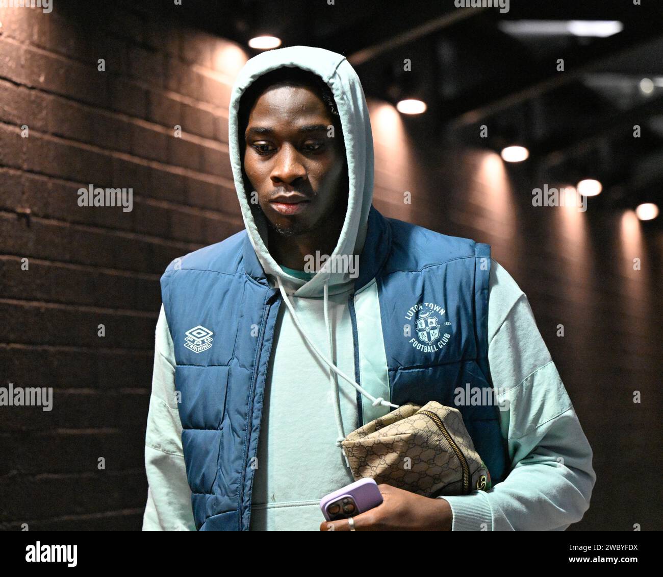 Burnley, UK. 12th Jan, 2024. Teden Mengi of Luton Town arrives ahead of