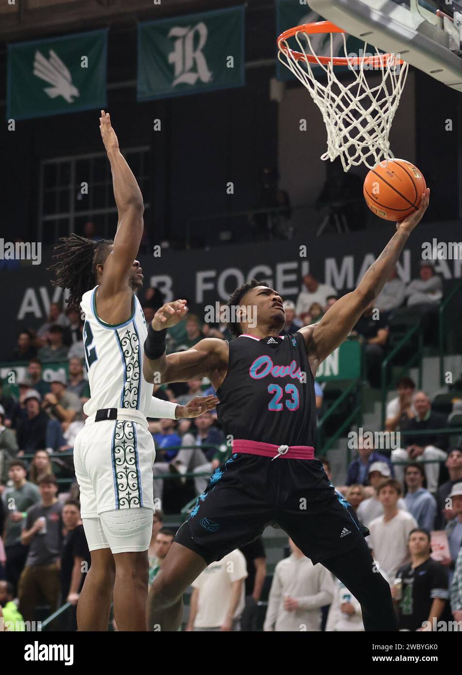 New Orleans, USA. 11th Jan, 2024. Florida Atlantic Owls guard Brandon Weatherspoon (23) shoots a