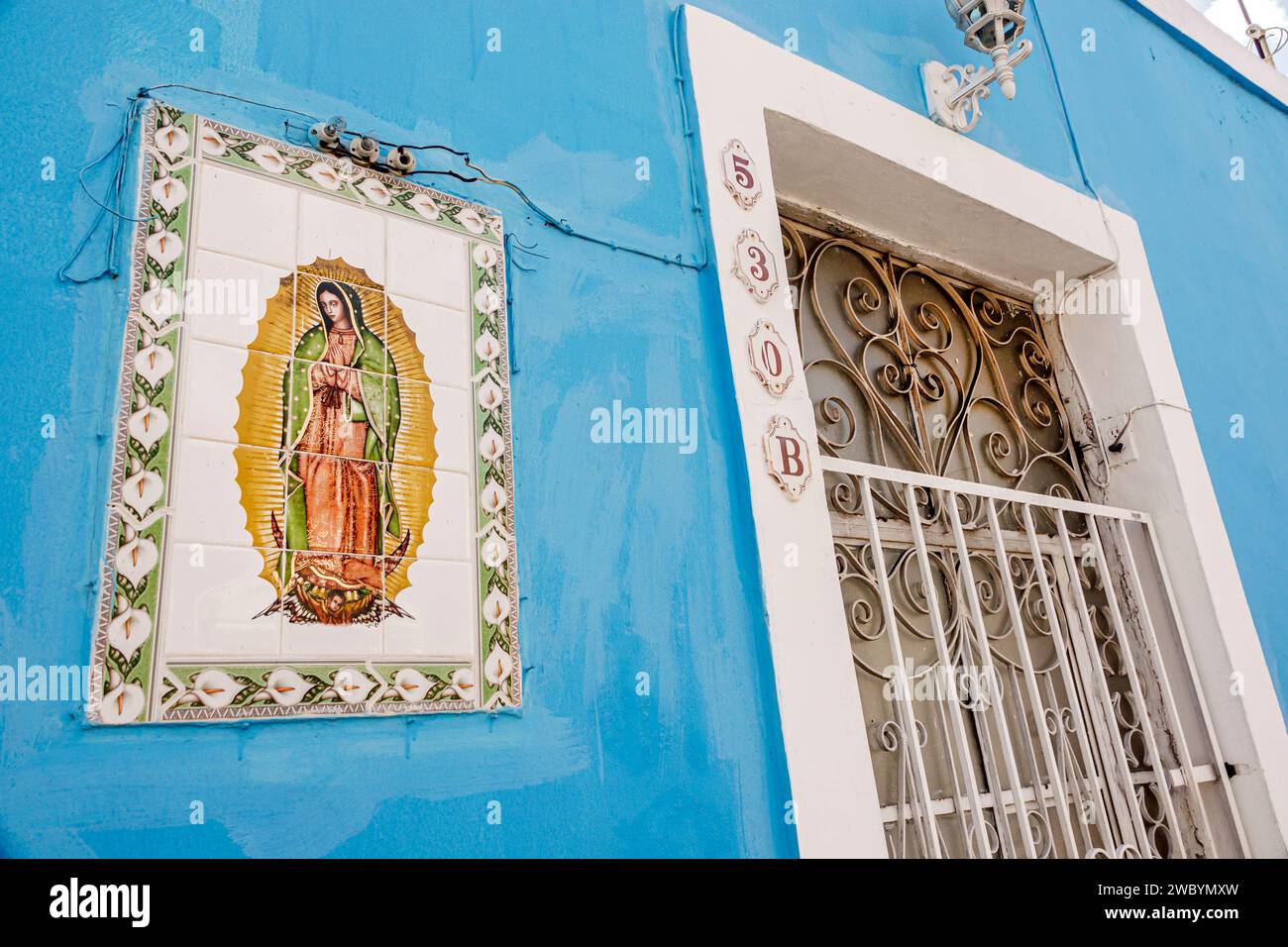 Merida Mexico,centro historico central historic district,residence homes residences preservation,ceramic tile religious Virgin Our Lady of Guadalupe,C Stock Photo