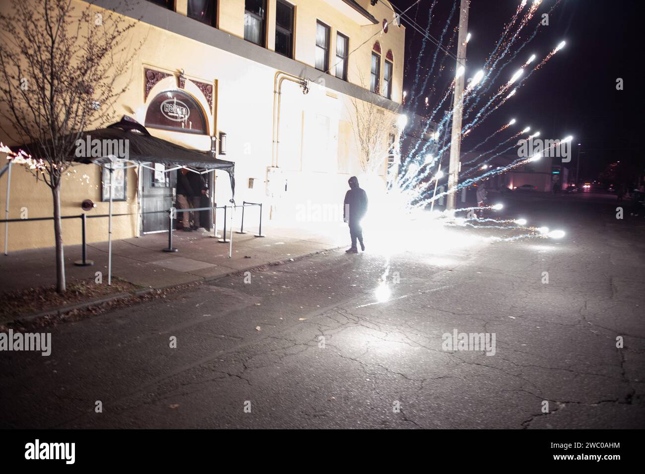 Portland, Oregon, USA. 12th Jan, 2024. A firework explodes outside the