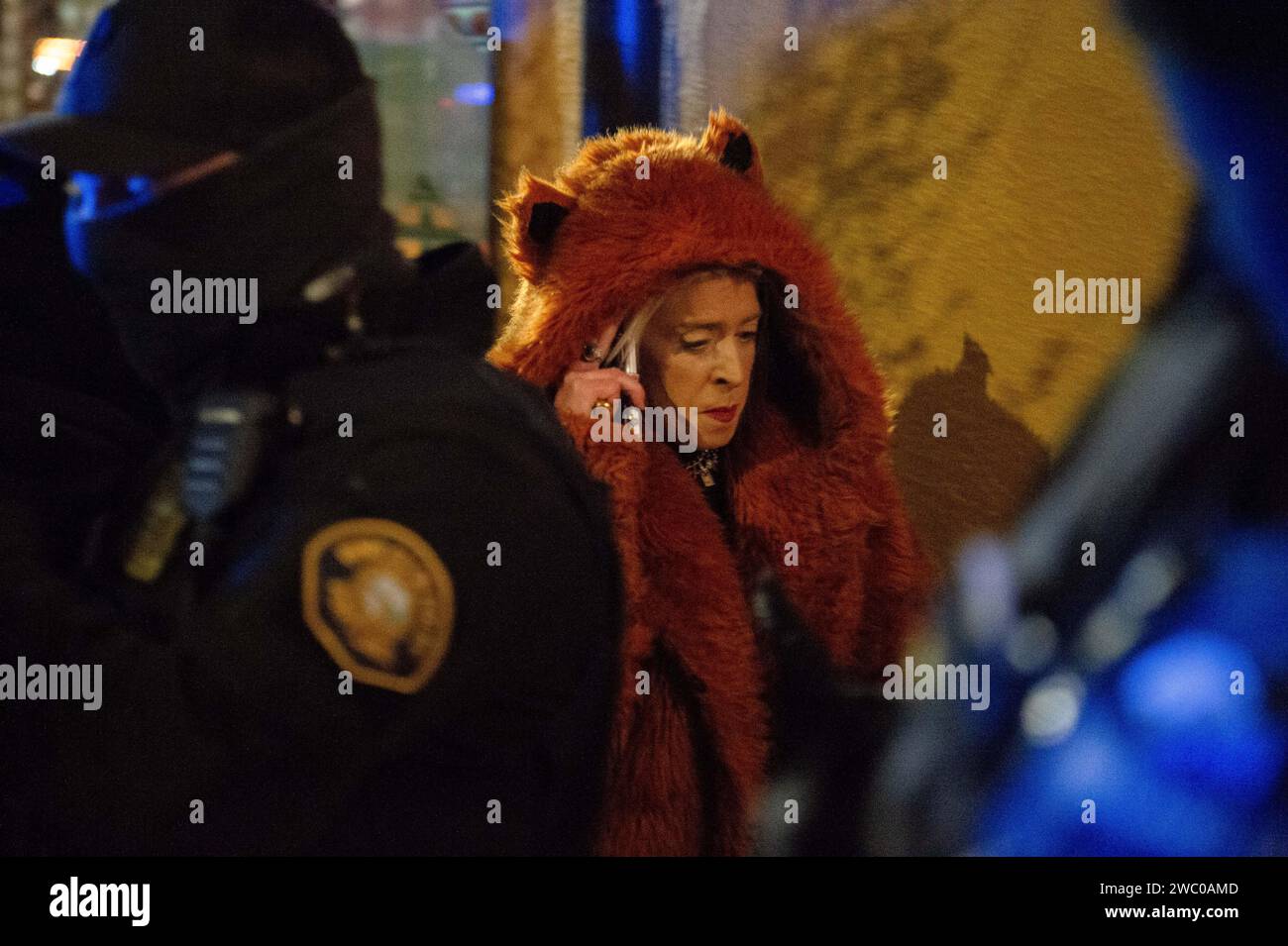 Portland, Oregon, USA. 12th Jan, 2025. A ticket holder walks past a