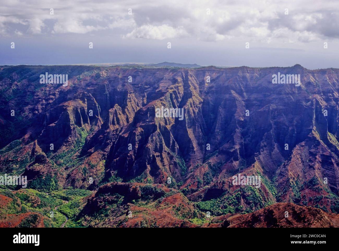 Waimea Canyon, also known as the Grand Canyon of the Pacific, is a large canyon, approximately ten miles (16 km) long and up to 3,000 feet (900 m) dee Stock Photo