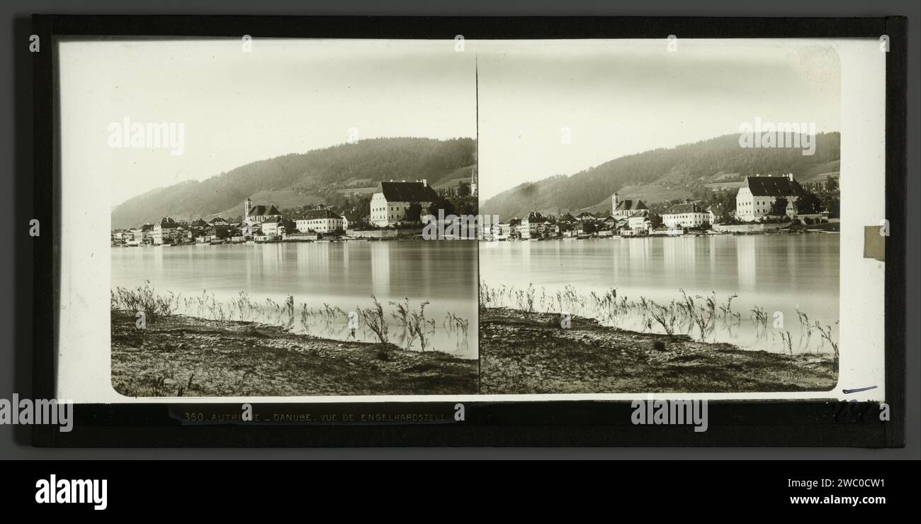 View of Engelhartszell on the Danube, Austria, Anonymous, 1856 - 1890   Engelhartszell Glass. Seal Rand: Paper slide prospect of city, town panorama, silhouette of city. river Donau. Engelhartszell Stock Photo