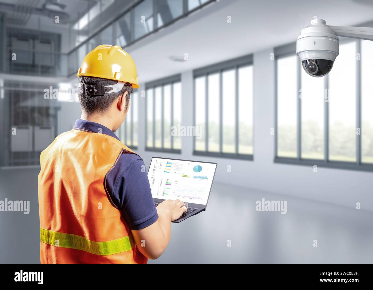 Engineer work with security camera or cctv camera in factory Stock