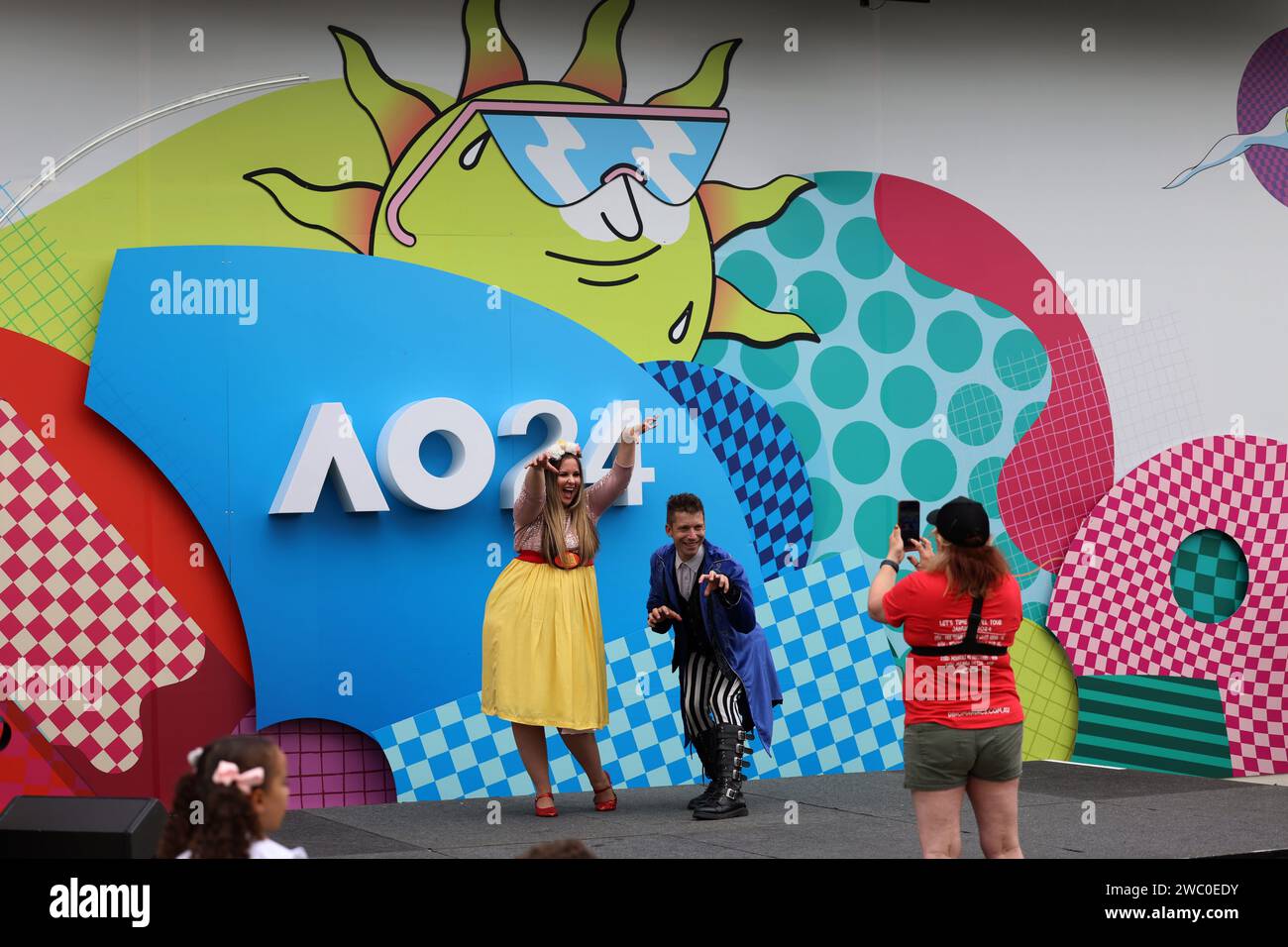 Melbourne, Australia. 13th Jan, 2024. People pose for photos during the