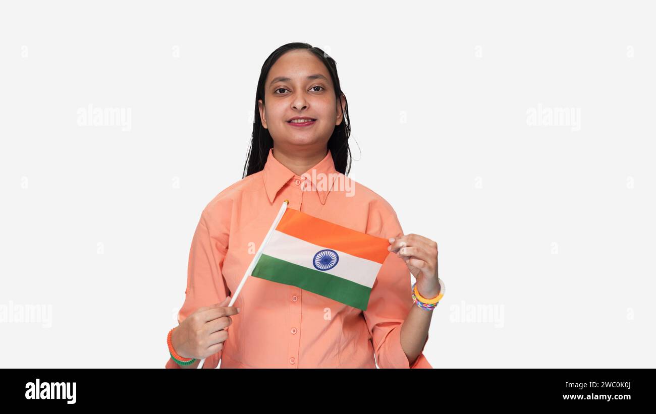 India 76 Republic Day, a young Indian girl holding the national flag hand. Stock Photo