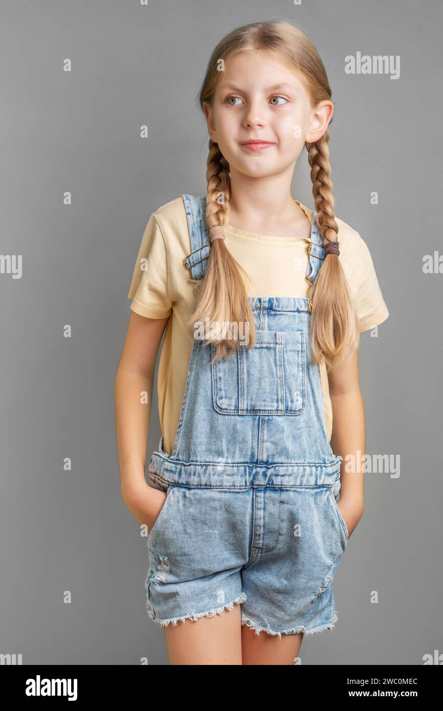 Portrait of a smiling little girl with blond braided hair Stock Photo ...