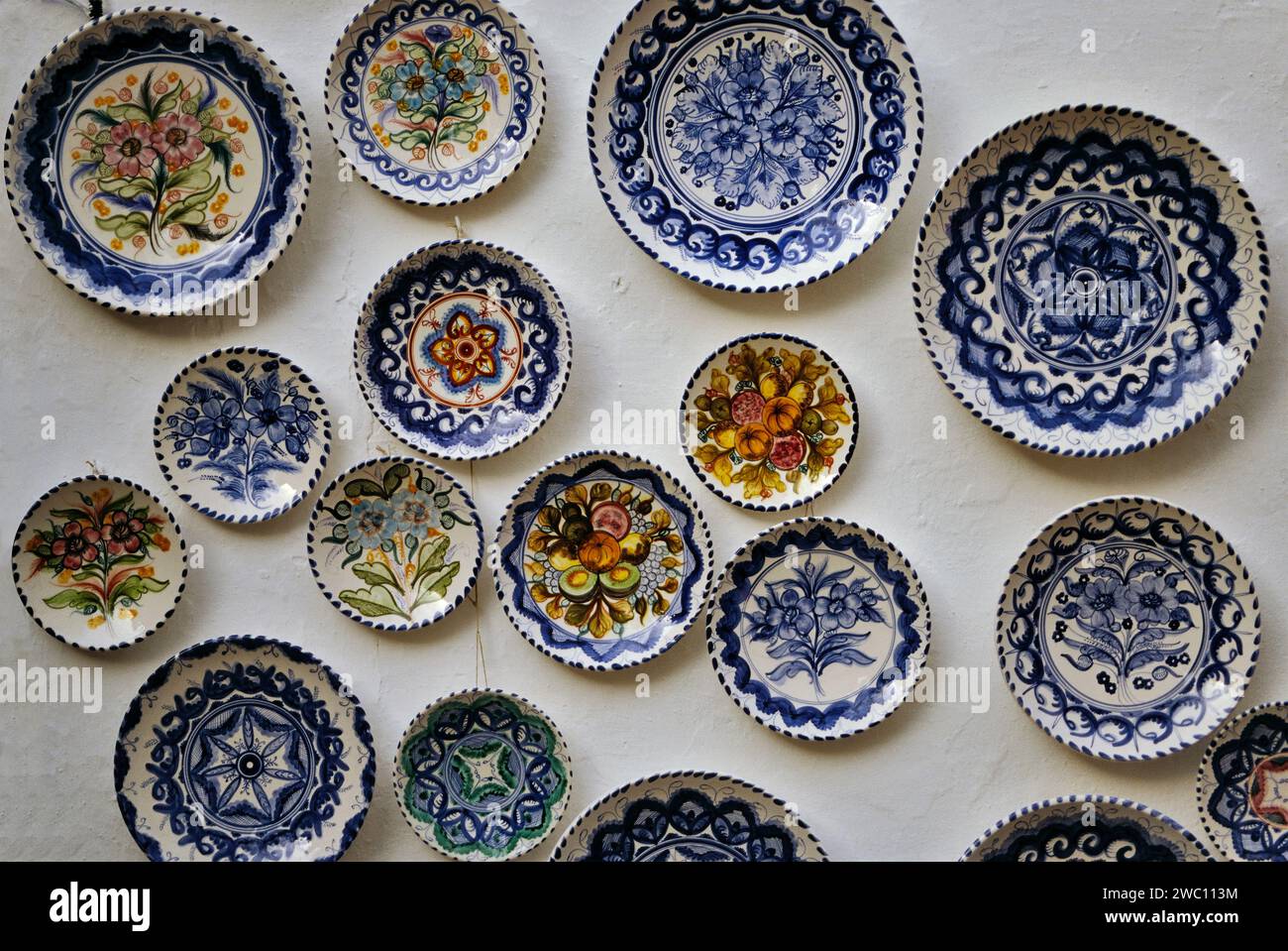 Handmade ceramic plates display at shop in Juderia, Old Jewish quarter in Cordoba, Andalusia, Spain Stock Photo