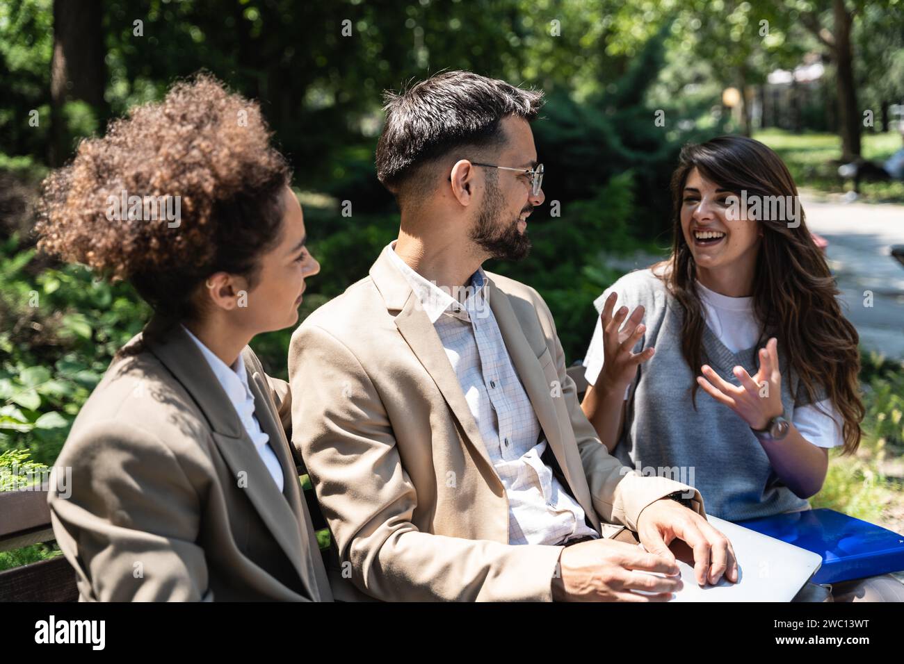 Group of young business people product strategy experts waiting for staff meeting with employer from human resources for job search in front of office Stock Photo