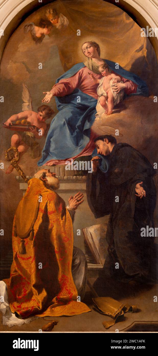 VICENZA, ITALY - NOVEMBER 5, 2023: The painting of Madonna with the St. Nicholas Tolentino and Nicholas of Bari in the Cathedral Stock Photo
