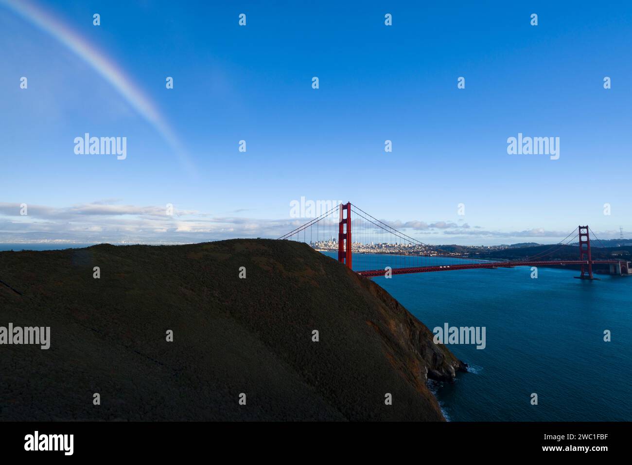 Rainbow over San Francisco and Golden Gate Bridge, California Stock Photo