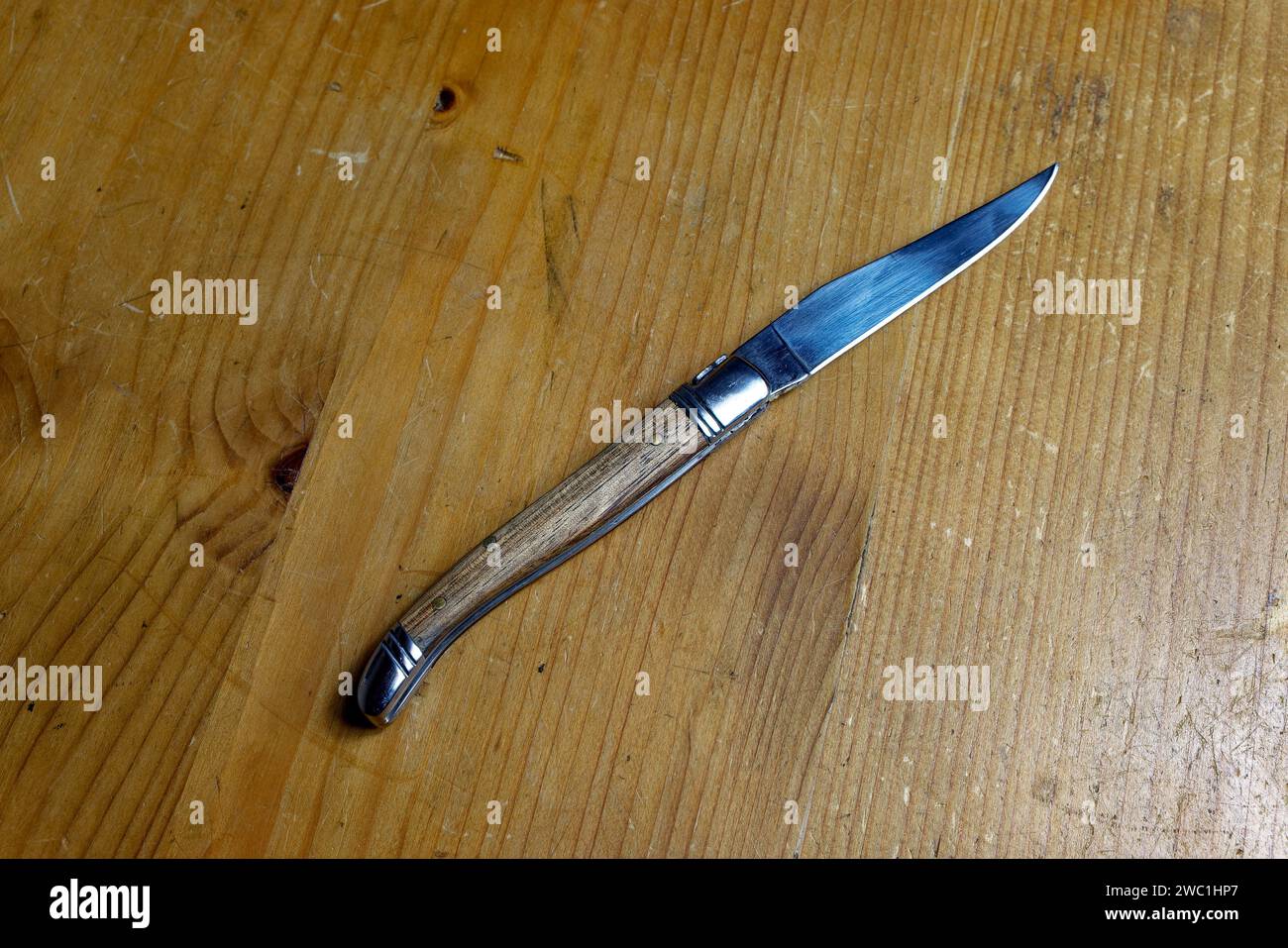 Laguiole knife opened, isolated with copyspace Stock Photo