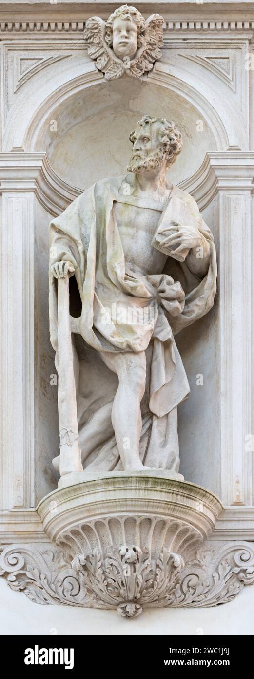 Vicenza - The statue of St. Jude Thaddeus the Apostle on the facade of church Santuario Santa Maria di Monte Berico in the evening light Stock Photo
