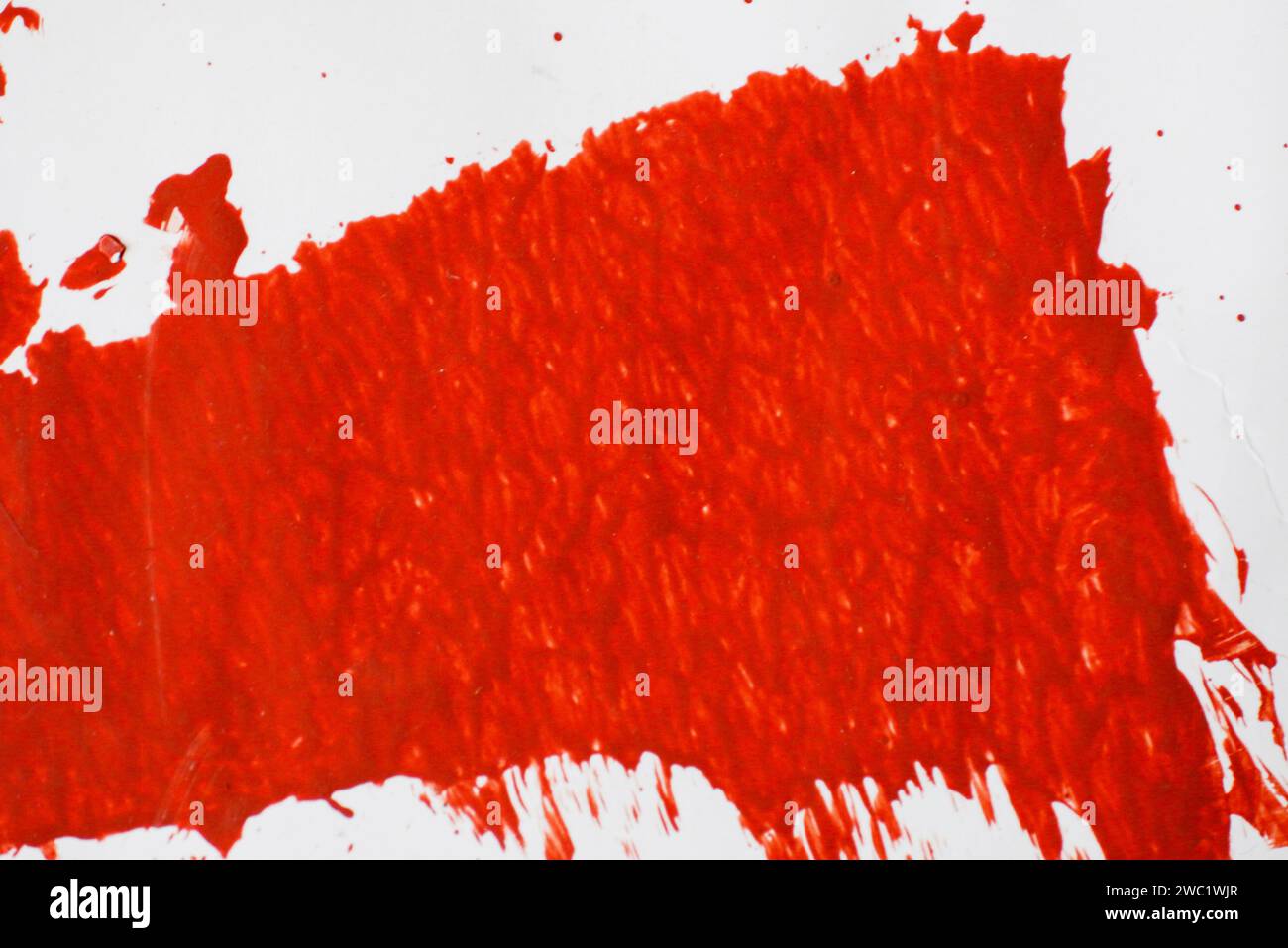 Red spot on paper. Red Brush Stroke isolated on white background Red