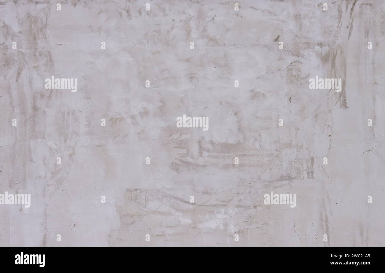 Abstract background from a wall covered with gray plaster. Stock Photo
