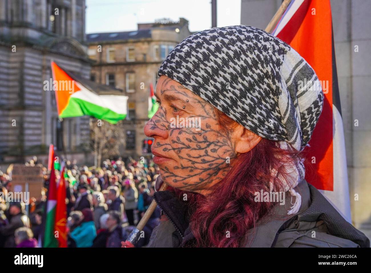 Glasgow, UK. 13th Jan, 2024. several hundred demonstrators took part in a Pro-Palestine, Pro Gaza, Anti- Israel rally in George Square, Glasgow outside the City Chambers. After speeches the rally planned to march through the city to the Ministry of Defence Scottish headquarters, in Brown Street, Glasgow. Credit: Findlay/Alamy Live News Stock Photo