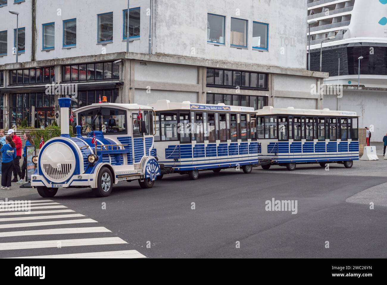 Tourist train running through the centre of Ålesund, Norway. Stock Photo