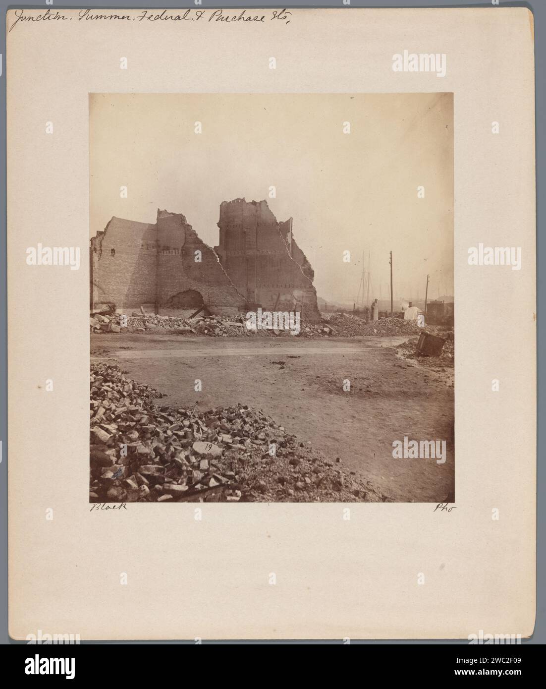 Ruins after the Great Boston Fire of 1872 at the intersection of Summer, Federal and Purchase Street, James Wallace Black, 1872 photograph  Boston cardboard. paper albumen print ruin of a building  architecture Boston Stock Photo