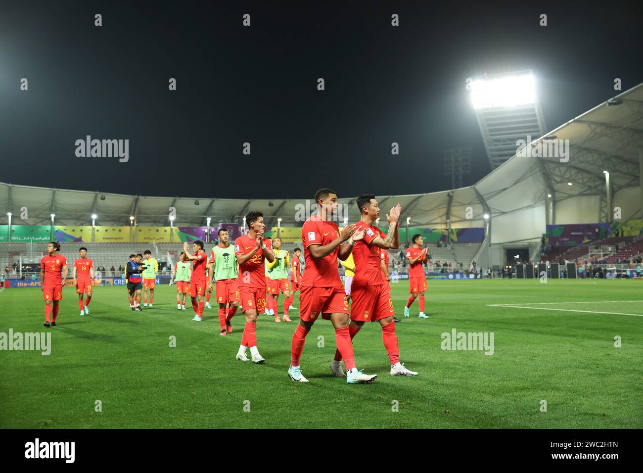 Doha, Qatar. 13th Jan, 2024. Players of China acknowledge the