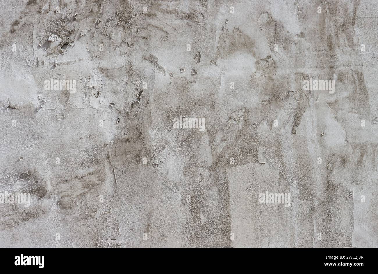 Cement wall covered with plaster. Stock Photo