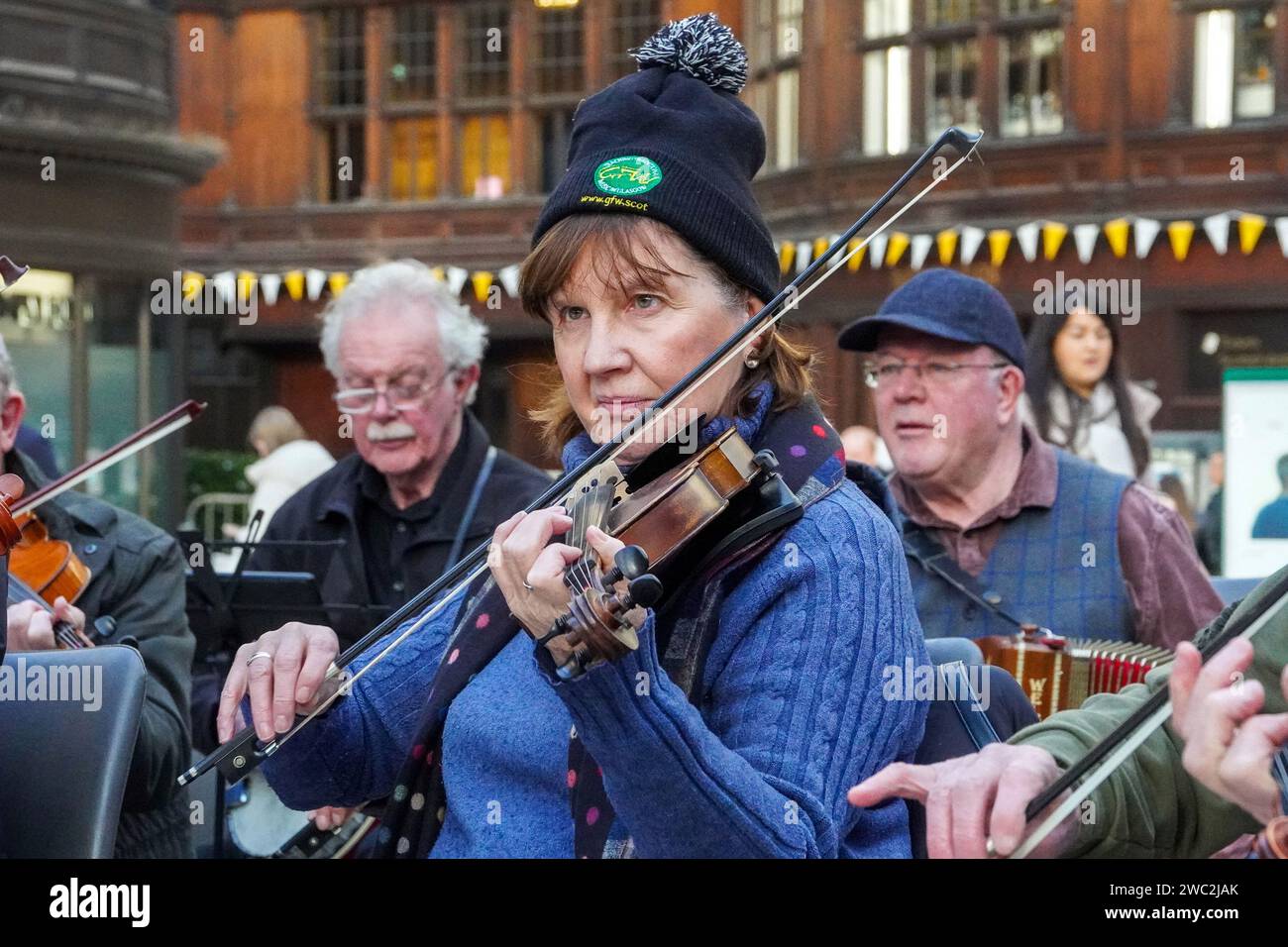 Glasgow, UK. 13th Jan, 2024. Pupils and tutors of Glasgow Fiddle