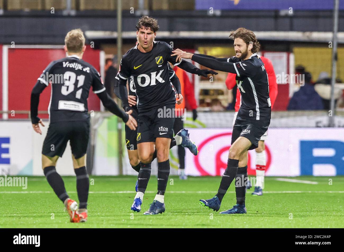 Emmen, Netherlands. 13th Jan, 2024. EMMEN, NETHERLANDS - JANUARY 13: Matthew Garbett of NAC Breda celebrates after scoring his sides first goal during the Dutch Keuken Kampioen Divisie match between FC Emmen and NAC at De Oude Meerdijk on January 13, 2024 in Emmen, Netherlands. (Photo by Pieter van der Woude/Orange Pictures) Credit: dpa/Alamy Live News Stock Photo