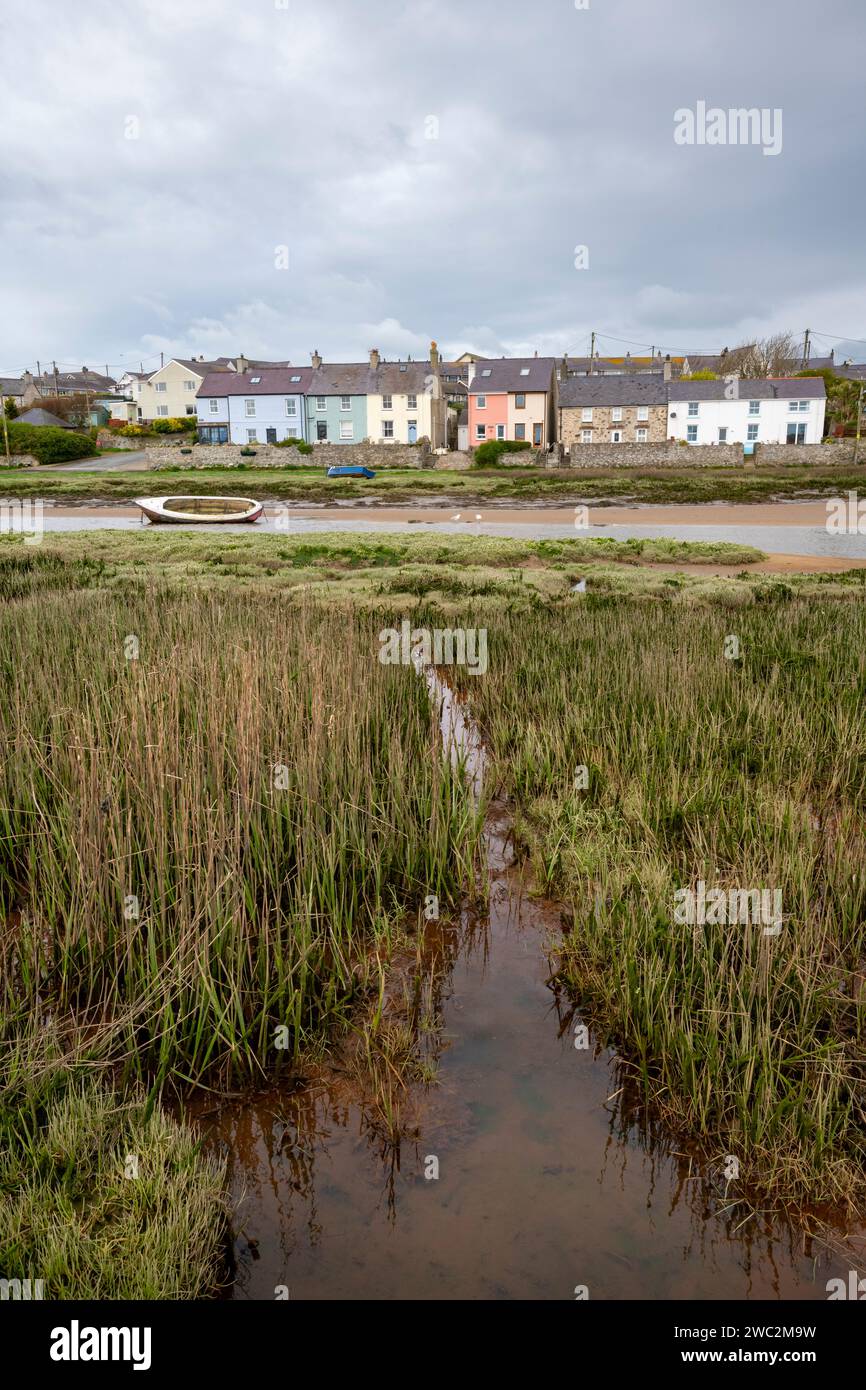 The village of Aberffraw on the west coast of Anglesey, North Wales. Houses beside the Afon Ffraw. Stock Photo