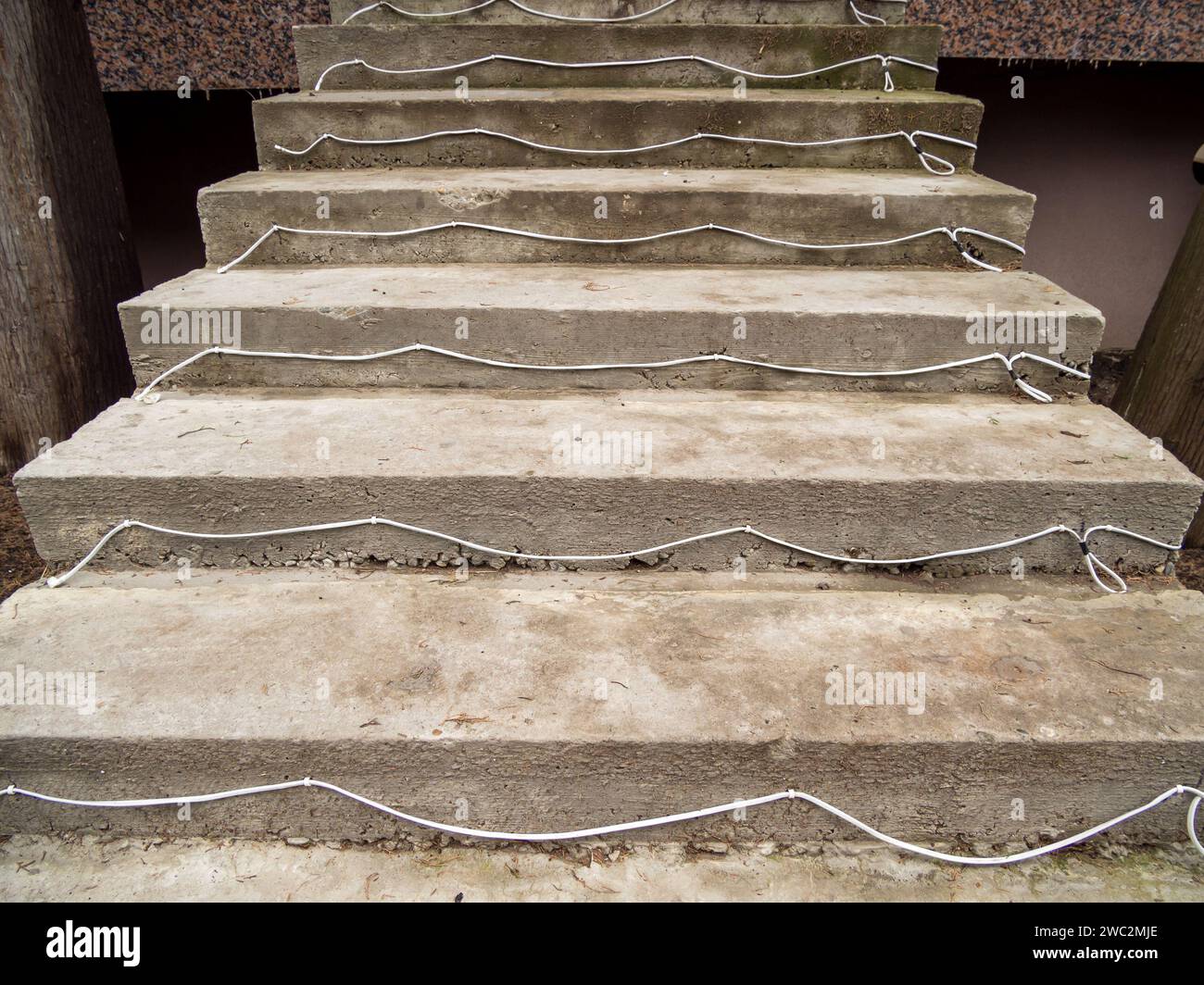 Draft staircase with wiring to illuminate steps Stock Photo - Alamy
