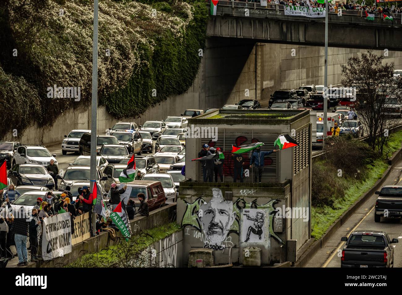 Seattle, WA January 6, 2024 Protesters shut down I5 freeway with a