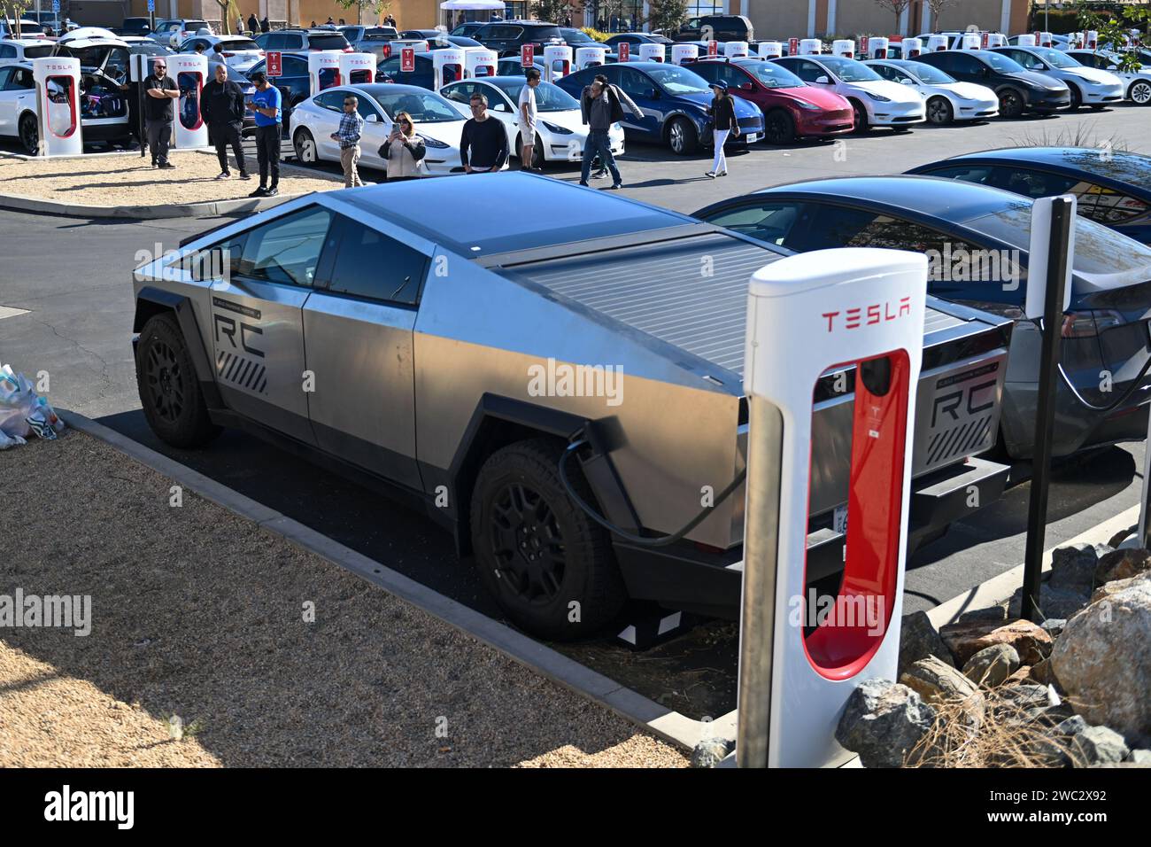 A Tesla Cybertruck is seen charging at The Outlets at Tejon, Friday