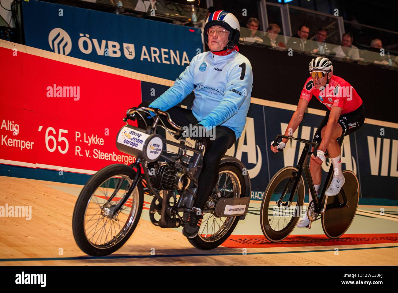 Team 6 - STARK-GEBÄUDEREINIGUNG - POLITT Nils ( GER ) - Black - Team 1 - BÄUERLEIN Peter ( GER ) - Querformat - quer - horizontal - Landscape - Event/Veranstaltung: Sixdays Bremen 2024 - Category/Kategorie: Cycling - Track Cycling  Sixdays - Elite Men - Location/Ort: Europe  Germany - Bremen - ÖVB Arena - Discipline: Derny Race - Distance: . m - Date/Datum: 12.01.2024  Friday  Day 1 - Photographer: © Arne Mill - frontalvision.com Stock Photo