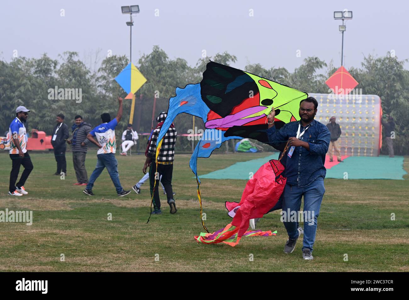 NEW DELHI, INDIA - JANUARY 13: People flying kites during the first ...