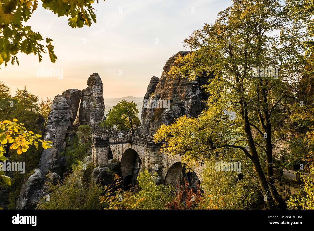 Federal Republic of Germany, Germany, Saxon Switzerland in Saxony, View of the Bastei Bridge at sunrise, Autumn, Saxon Switzerland, Saxony, Federal Stock Photo