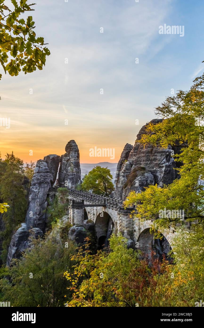 Federal Republic of Germany, Germany, Saxon Switzerland in Saxony, View of the Bastei Bridge at sunrise, Autumn, Saxon Switzerland, Saxony, Federal Stock Photo