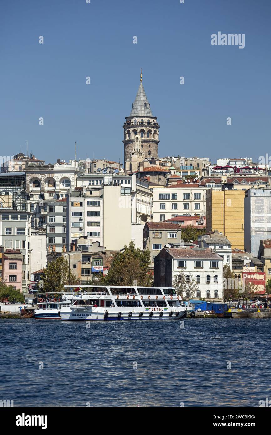 Ship on Golden Horn and Galata Tower, Istanbul, Turkey Stock Photo