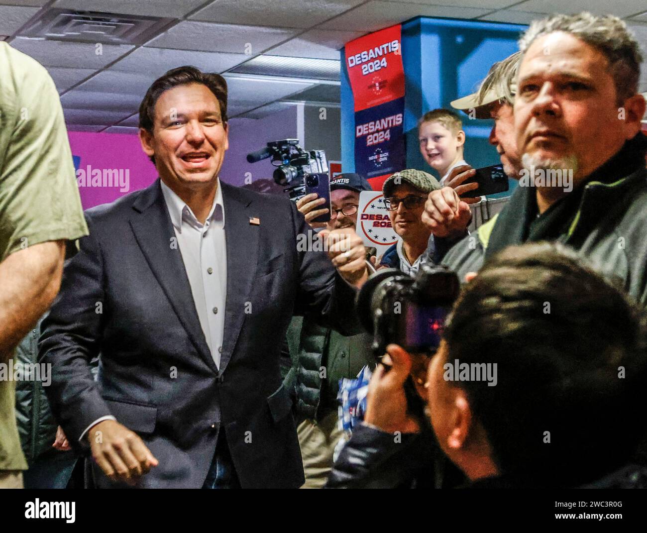 West Des Moines, United States. 13th Jan, 2024. Florida Governor and Republican presidential candidate Ron DeSantis arrives to speak to supporters at the Never Back Down Iowa headquarters in West Des Moines, Iowa, Saturday, January 13, 2024. Iowa Republican voters will gather to caucus on January 15th to select their candidate for US president. Photo by Tannen Maury/UPI Credit: UPI/Alamy Live News Stock Photo