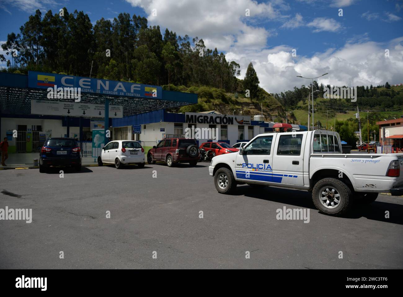 Tulcan, Ecuador. 13th Jan, 2024. Ecuador's national police guards the border amid Ecuador's internal armed conflict as narco violence spreads across the country, January 13, 2024, in Tulcan, Ecuador. The Colombia - Ecuador border bridge Rumichaca was heavily enforced by Colombia's army after allegations that alias 'Fito' fled to Colombia after escaping prision. Photo by: Camilo Erasso/Long Visual Press Credit: Long Visual Press/Alamy Live News Stock Photo