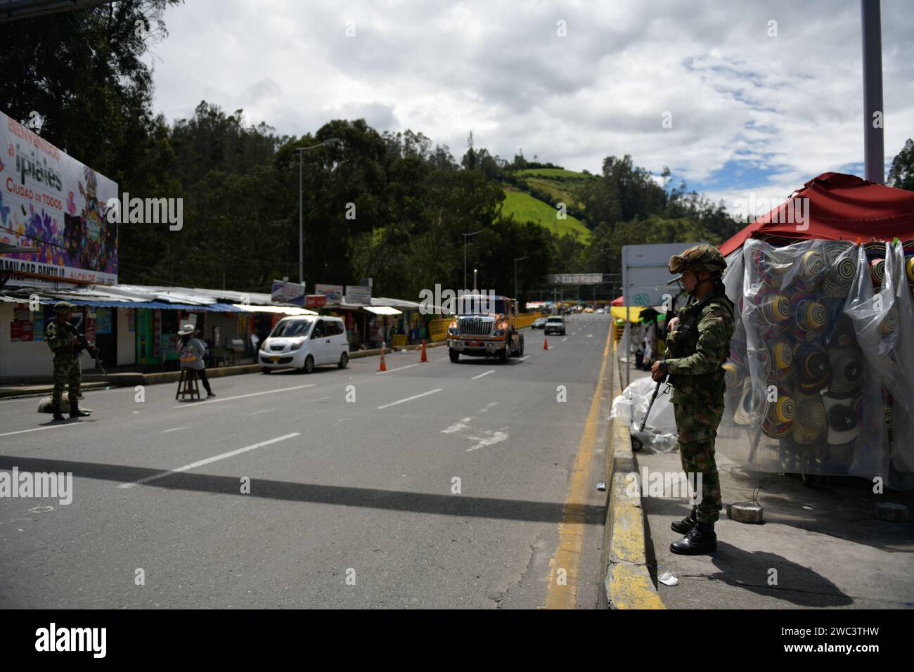 Colombia's national army heavily guards the border Rumichaca bridge with Ecuador amid Ecuador's internal armed conflict as narco violence spreads across the country, January 13, 2024, in Ipiales, Colombia. The Colombia - Ecuador border brifge Rumichaca was heavily enforced by Colombia's army after allegations that alias 'Fito' fled to Colombia after escaping prision. Photo by: Camilo Erasso/Long Visual Press Credit: Long Visual Press/Alamy Live News Stock Photo