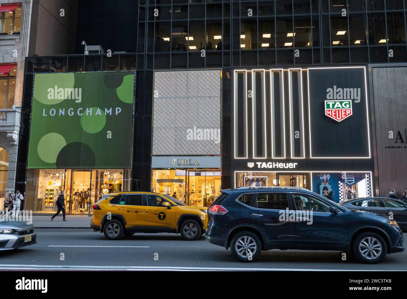 Upscale stores line Fifth Avenue in New York City, USA 2024 Stock Photo ...