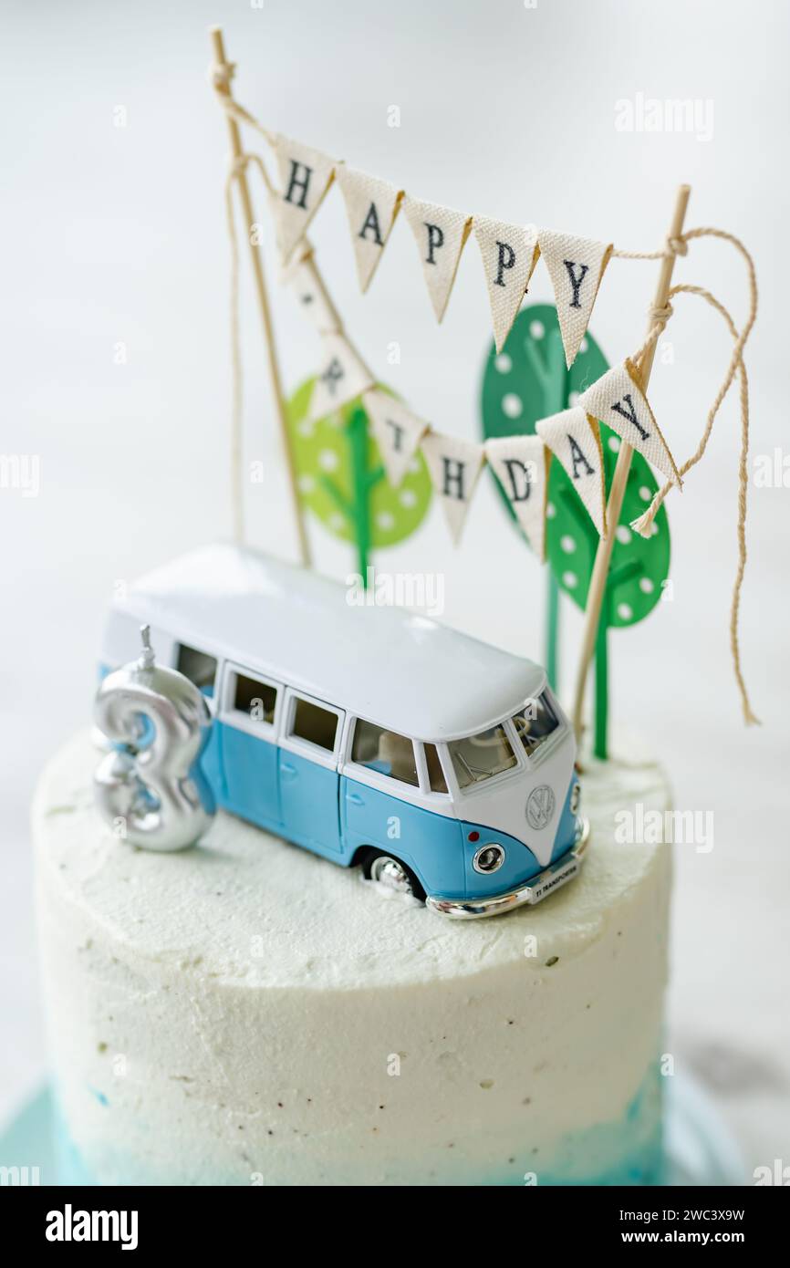 Birthday cake for three year old toddler boy decorated with paper