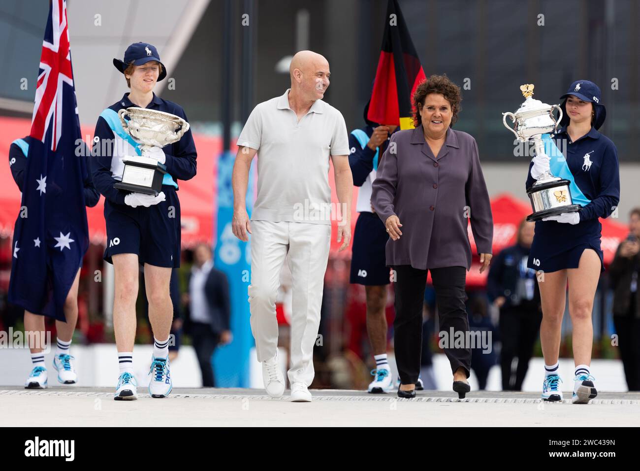 Melbourne, Victoria, Australia. 14th Jan, 2024. MELBOURNE, AUSTRALIA - JANUARY 14: Andre Agassi and Evonne Goolagong Cawley pose with the Norman Brookes Challenge Cup and the Daphne Akhurst Memorial Cup at the Trophy arrival ceremony during day one of the 2024 Australian Open at Melbourne Park on January 14, 2024 in Melbourne, Australia (Credit Image: © Chris Putnam/ZUMA Press Wire) EDITORIAL USAGE ONLY! Not for Commercial USAGE! Stock Photo